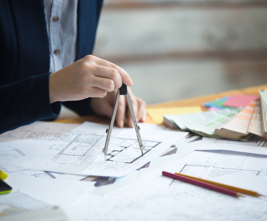 demo-attachment-13-female-architect-using-drawing-compass-PZNMCEU-min